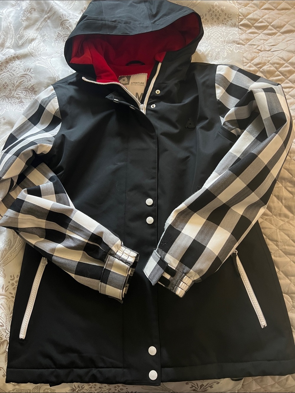 Aperture Black Jacket with Black & White Plaid Sleeves and Red Hood